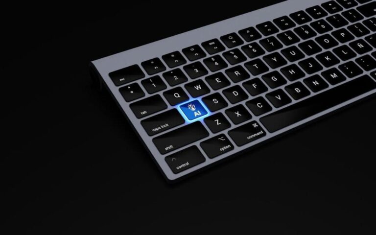 A keyboard with a glowing "AI" button, representing AI for digital asset management.