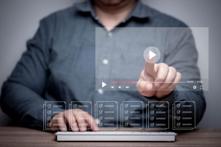 Professional creating video content using a digital asset management video production system.